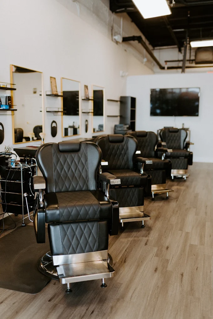 Row of barber chairs at Victory Barbershop in West Boca Raton