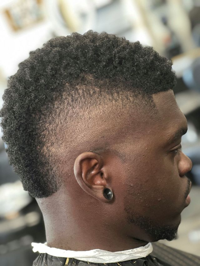 Blowout haircut by Dimitri Popazoglo at Victory Barbershop in Boca Raton