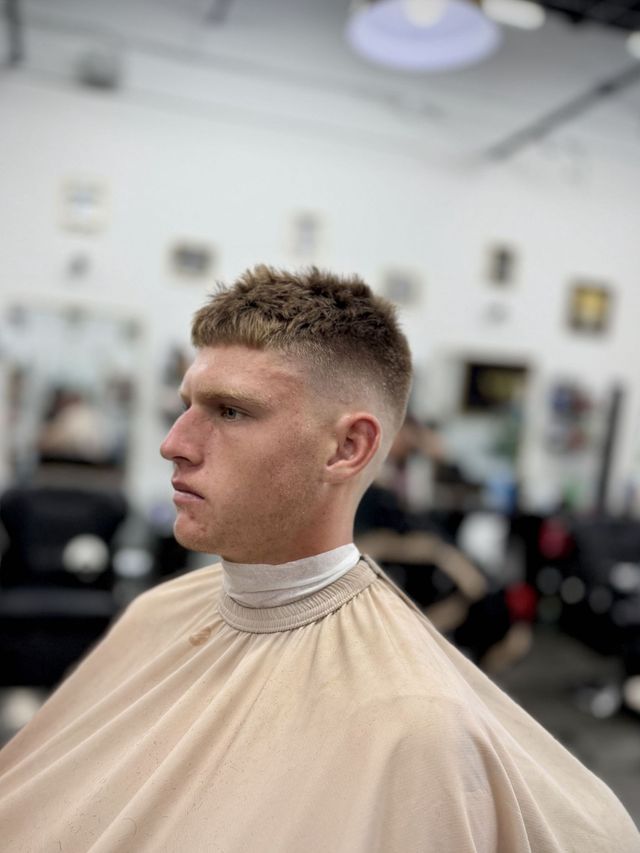 Mid fade haircut work by Gary Visions at Victory Barbershop in Boca Raton